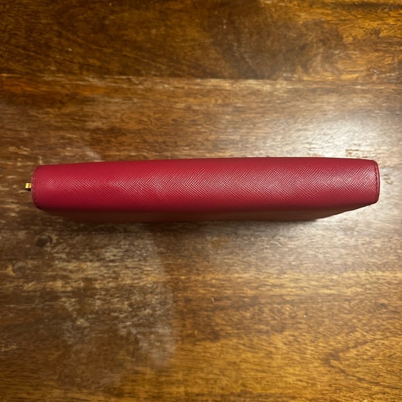 Authentic Prada Elegant Bow Wallet in dark pink/purple color. - Picture 13 of 16